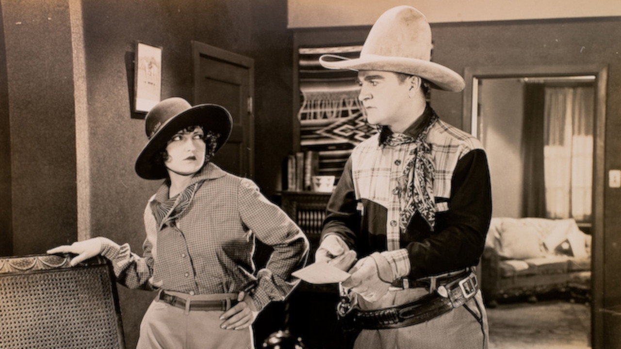 The Vanishing Rider (1928) movie backdrop