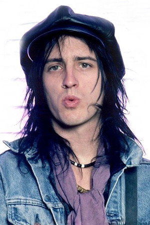 Izzy Stradlin in Guns N' Roses: 2 Classic Albums Under Review: Use Your Illusion I and II