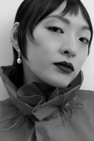 Patricia Zhou in Orange Tree