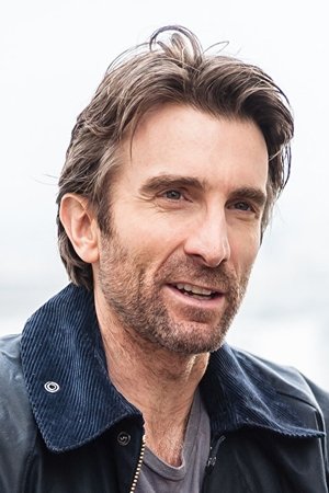 Sharlto Copley in The Hollars
