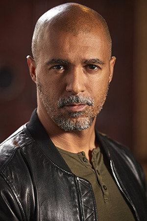 Damian T. Raven in Kiss and Kill
