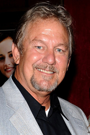 Ernie Lively in A Stranger to Love