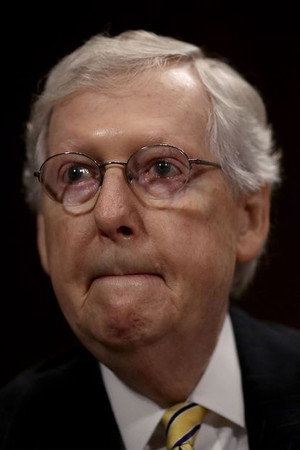 Mitch McConnell in Holding Liat