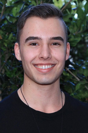 Evan Henzi in An Open Secret